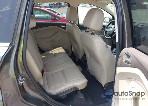 2017 Ford Escape Titanium z USA, uszkodzony, nr VIN 1FMCU0J97HUC12229